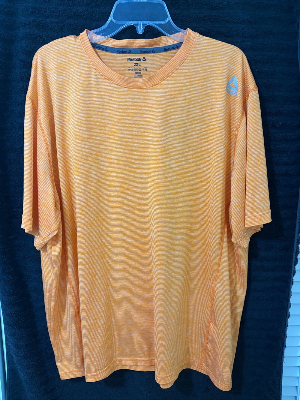 Reebok Men’s Heathered Orange Short Sleeve Performance Tees (2)